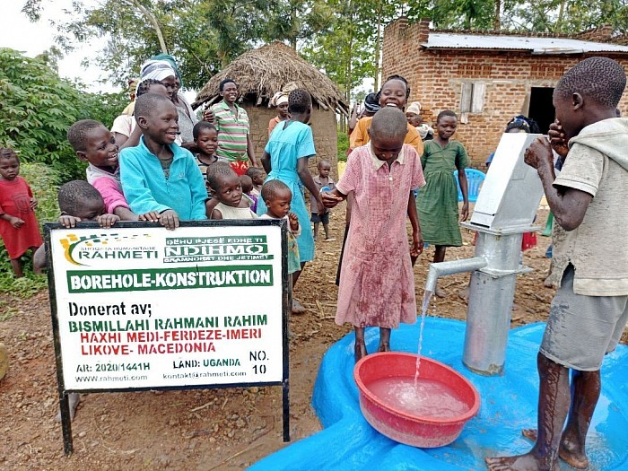 The community people are happy for receiving the clean water Alihamudlilah